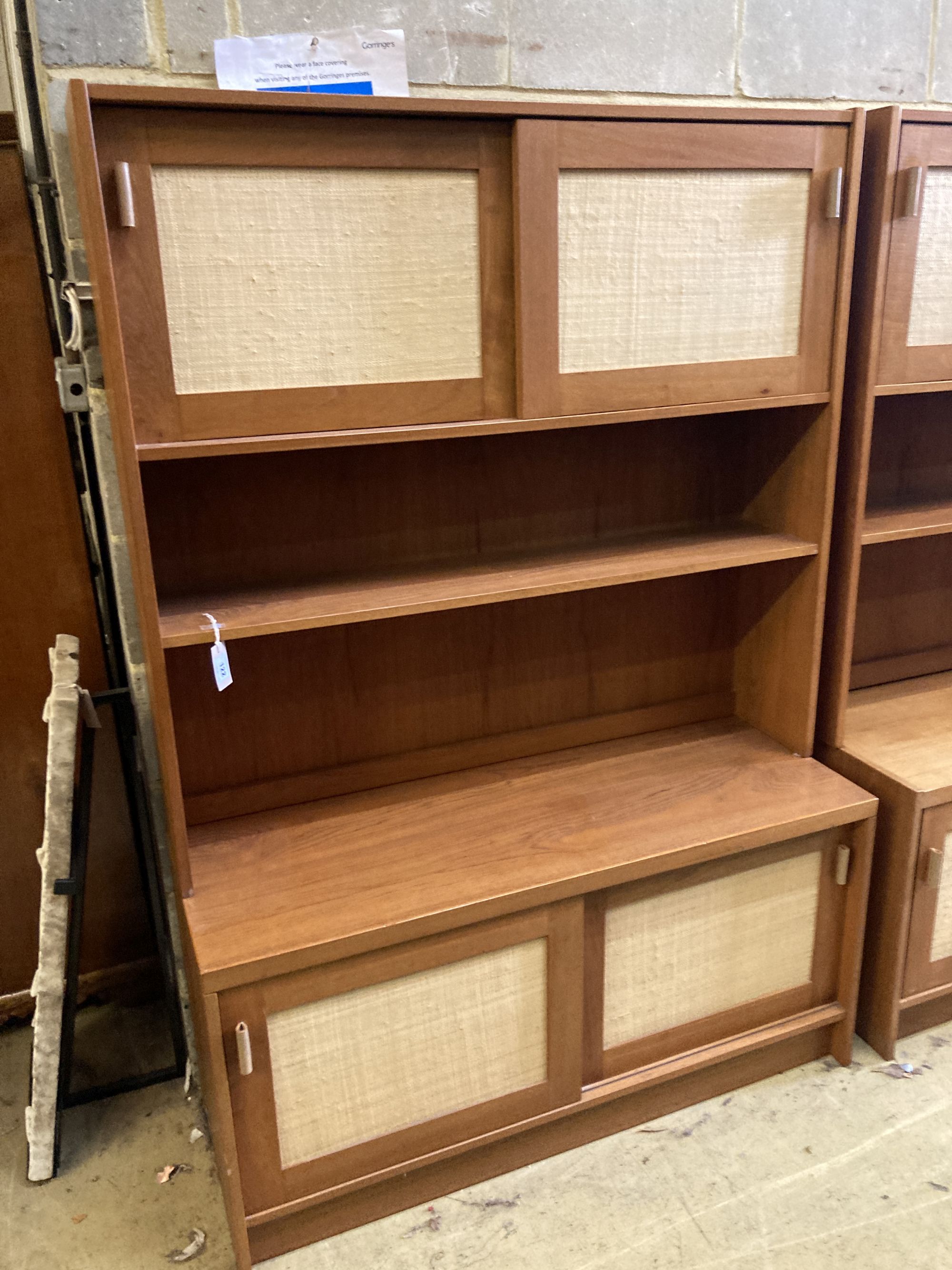 Three near-matching teak side cabinets,